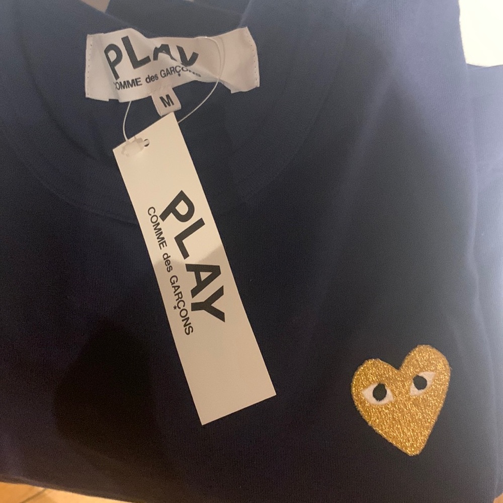 Play INspire tshirt … very cool runs slim . Can be unisex.